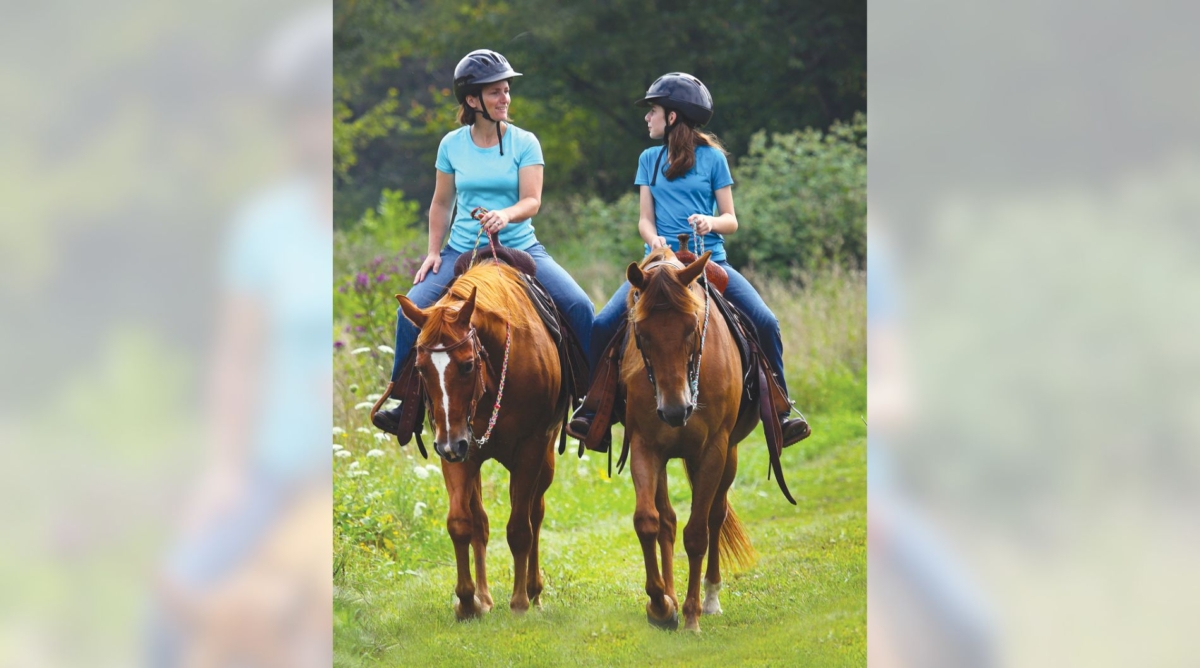 Two horseback riders on the Bridle Trail at Silver Creek Metro Park