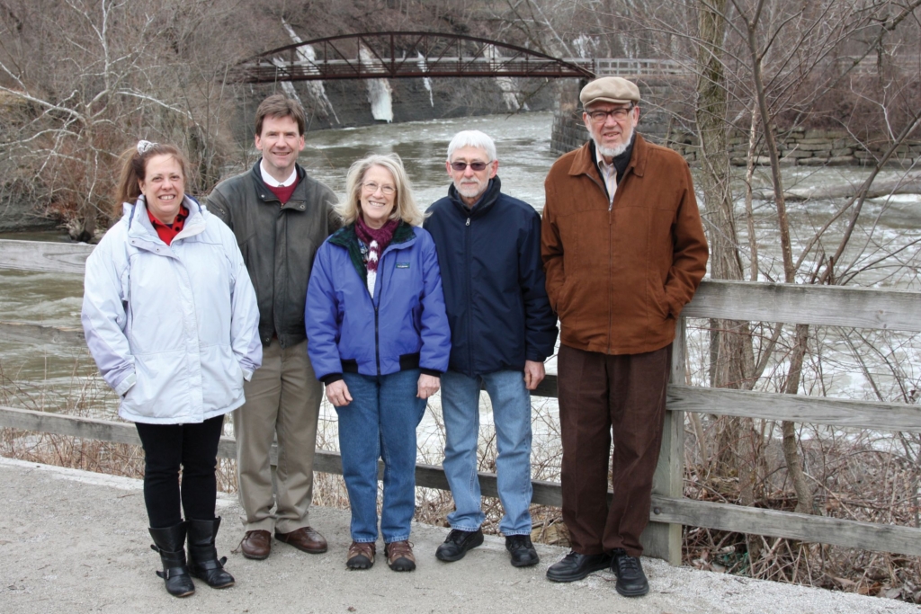 Elaine with Friends of the Crooked River board members standing in front of river