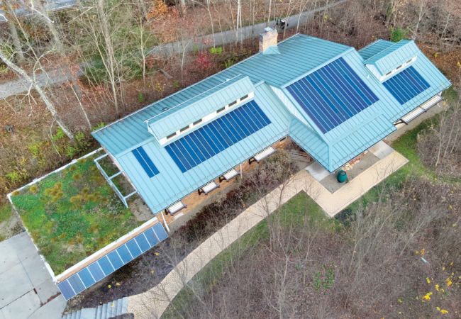 overhead view of the green building at Summit Metro Parks, showing solar panels and a roof top garden