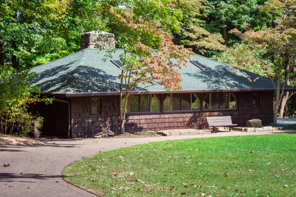 Lodge exterior with a brick walking path