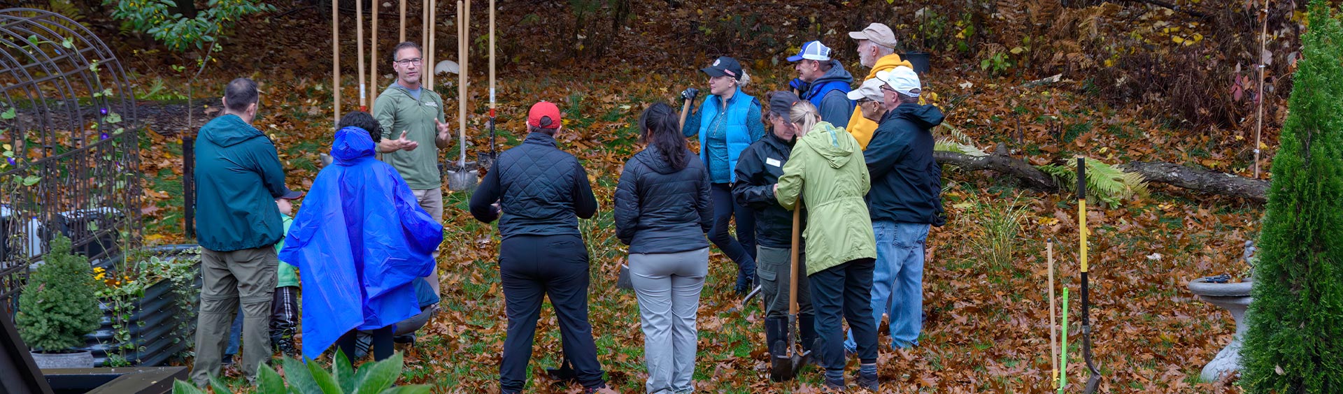 A group of volunteers being given instruction